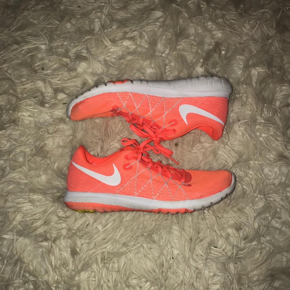 Peach colored nike running shoes!